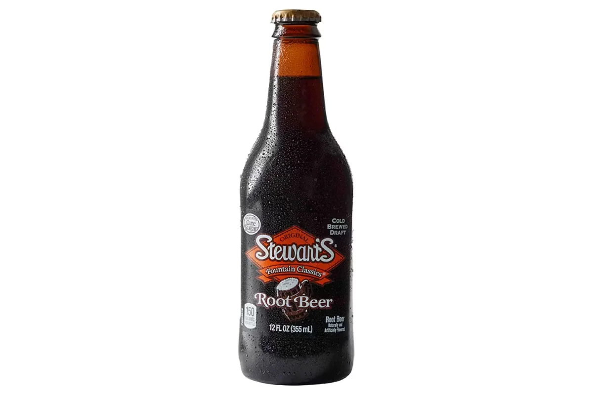 Cracker Barrel's Bottled Root Beer, a classic, fizzy drink served cold for a refreshing treat.
