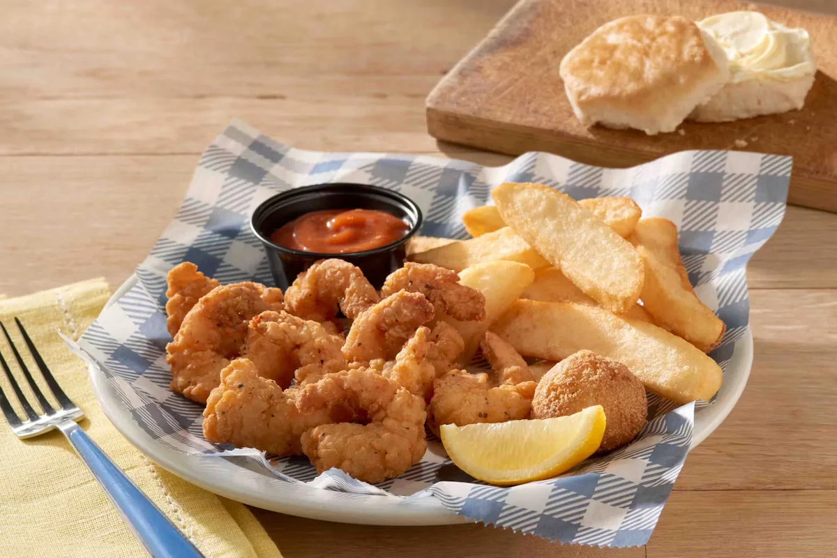 Cracker Barrel's Crispy Rockin' Shrimp, golden-fried shrimp served with a tangy dipping sauce and classic sides.
