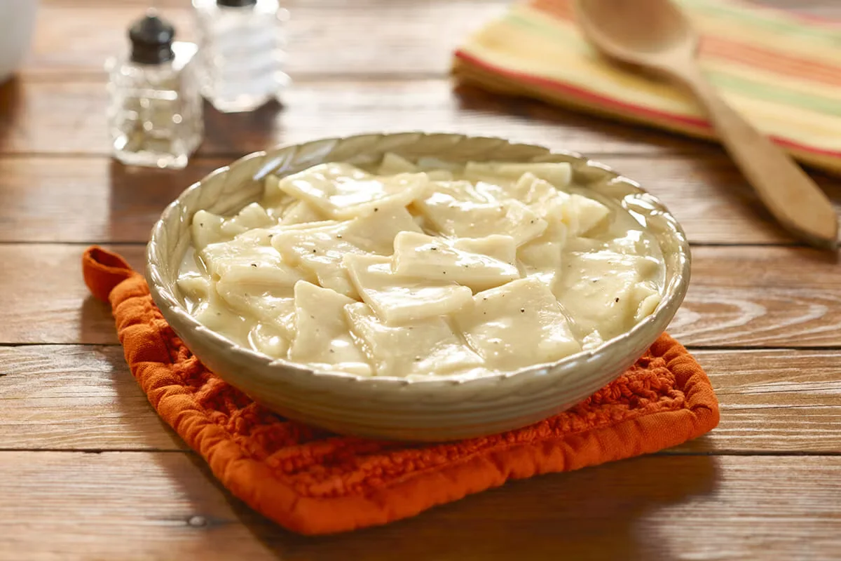 Cracker Barrel's soft and savory dumplins served in a flavorful broth as a classic side dish.