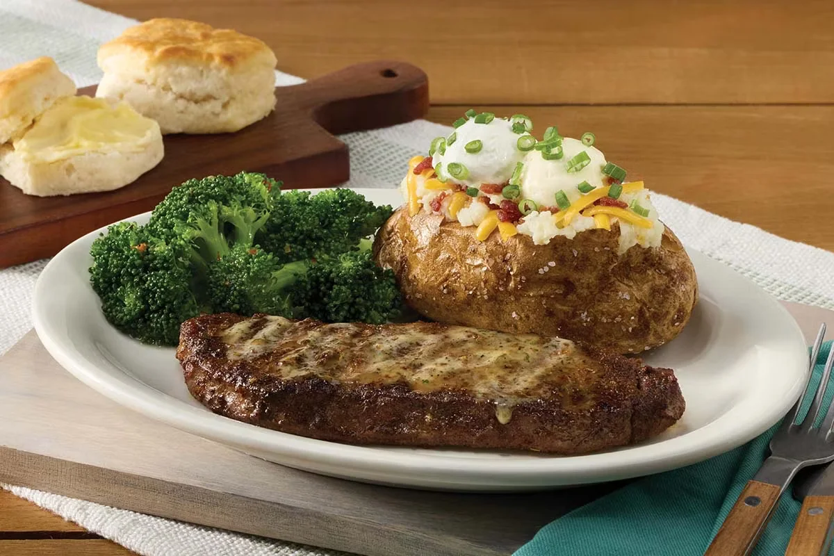 Cracker Barrel's New York Strip Steak, a juicy, perfectly grilled steak served with your choice of homestyle sides.