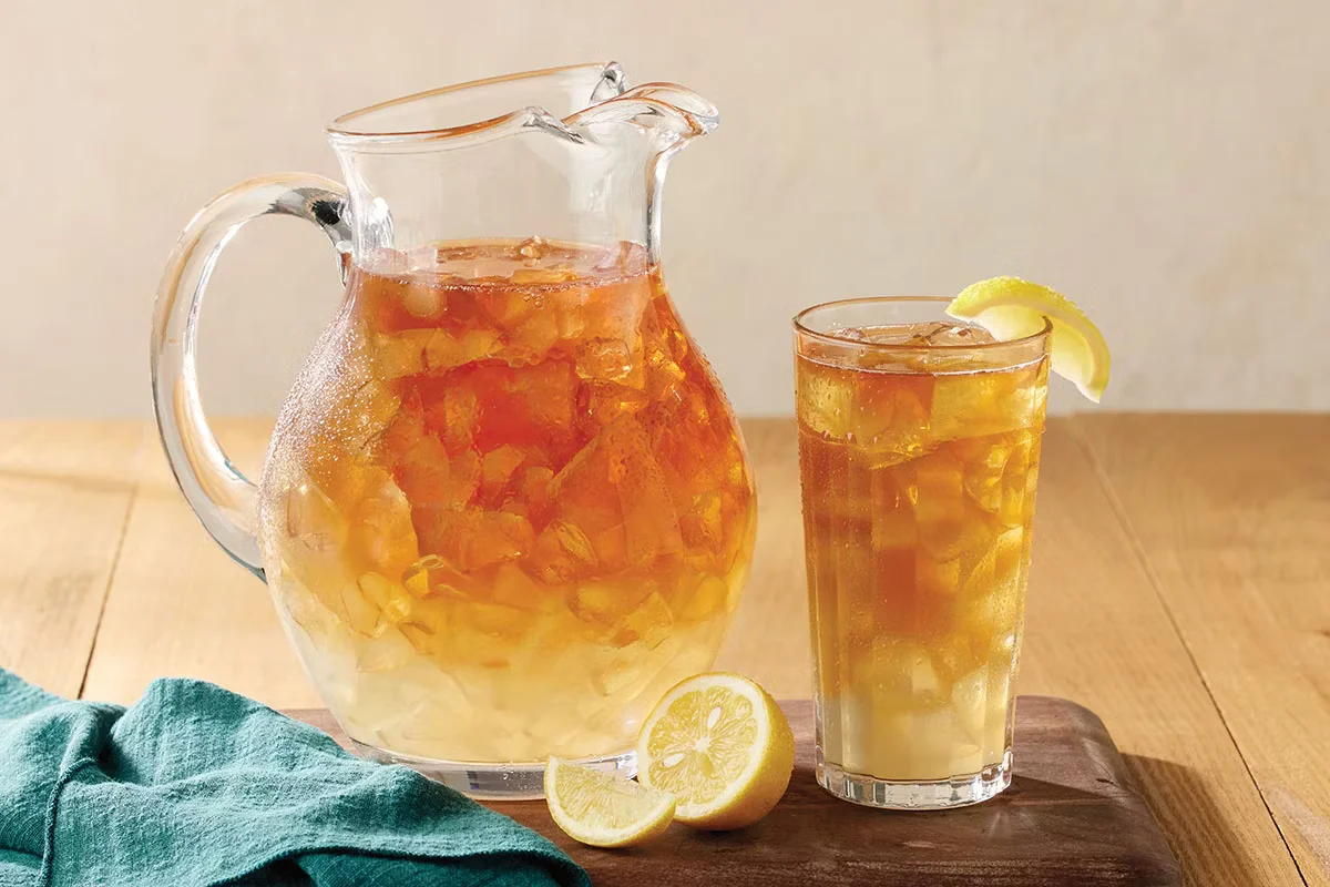 Cracker Barrel's Southern Half n' Half Half Gallon with a blend of iced tea and lemonade, served chilled.